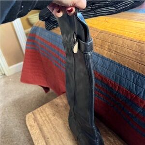 Knee high black leather boots